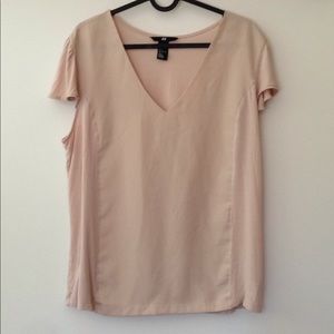 A tan/pink h&m blouse.